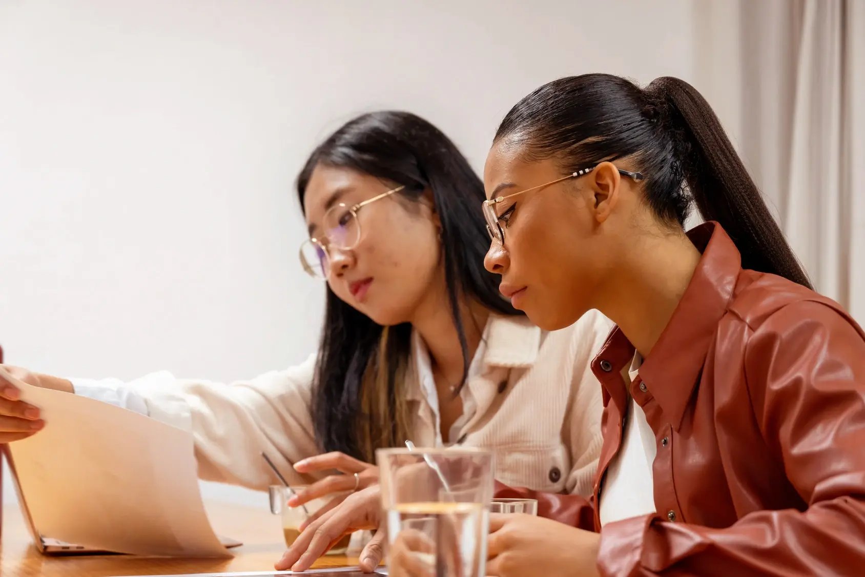 Business people collaborating at a meeting Business people collaborating at a meeting