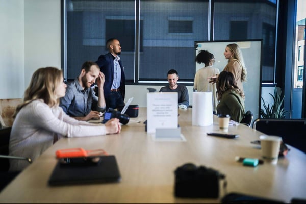 a team meeting in a board room