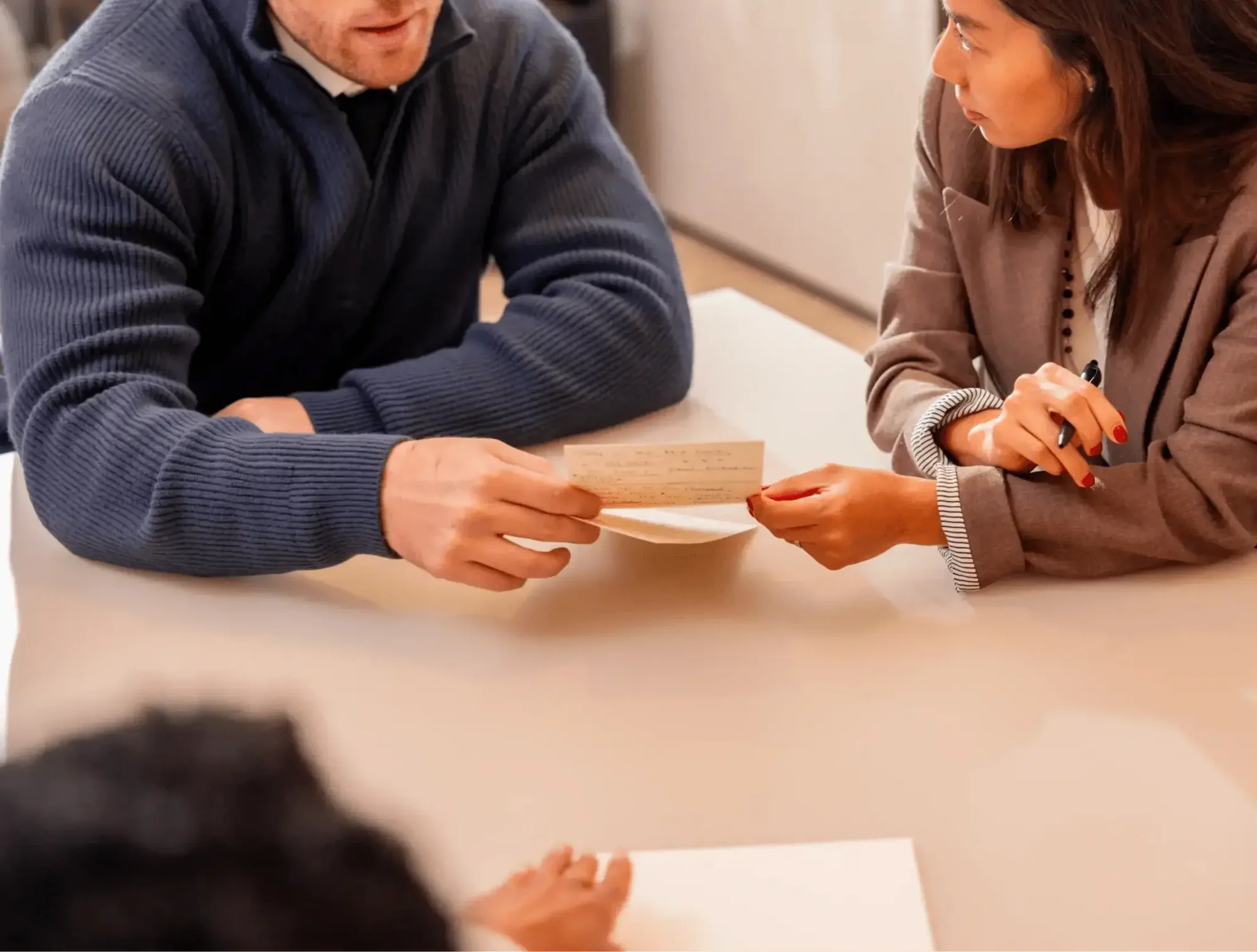 Business-people-sharing-notes-1_Feb-26-1